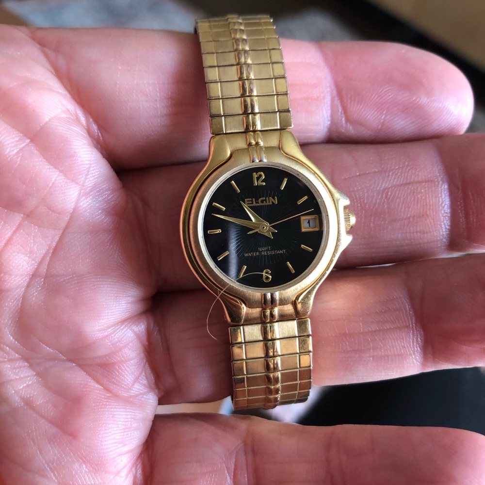 Gold and Black Wearable Watch